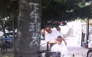 Roadside Barber Qingdao, China